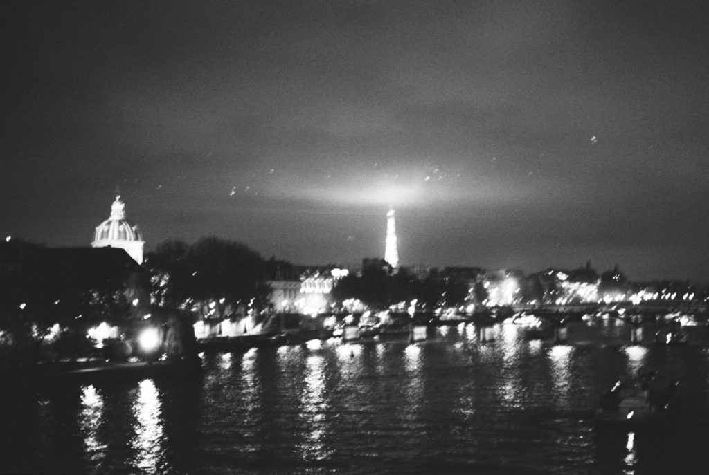 Dreamy Eiffel Tower and Seine river photographed at night, on kodak tri-x 400. Holly Michon Photography