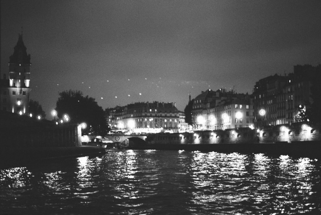The Seine river photographed at night on black/white kodak tri-x 400 and a Pentax camera. Photo by Holly Michon Photography. 