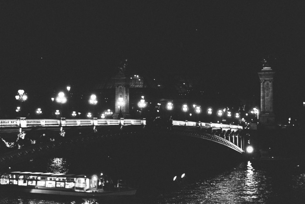 The Seine river photographed at night on kodak tri-x 400 and a Pentax camera. Photo by Holly Michon Photography. 