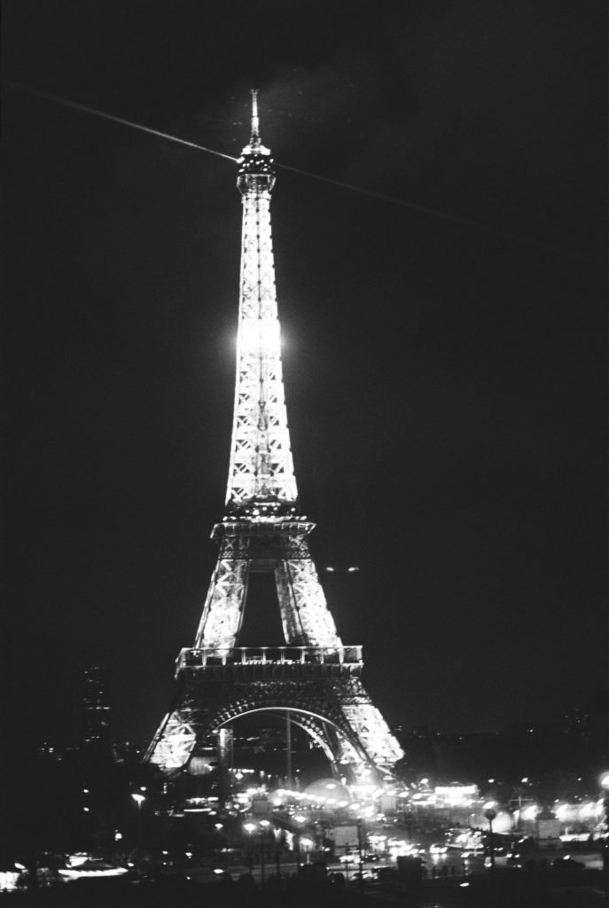 Dreamy Eiffel Tower photographed at night, on kodak tri-x 400. Holly Michon Photography