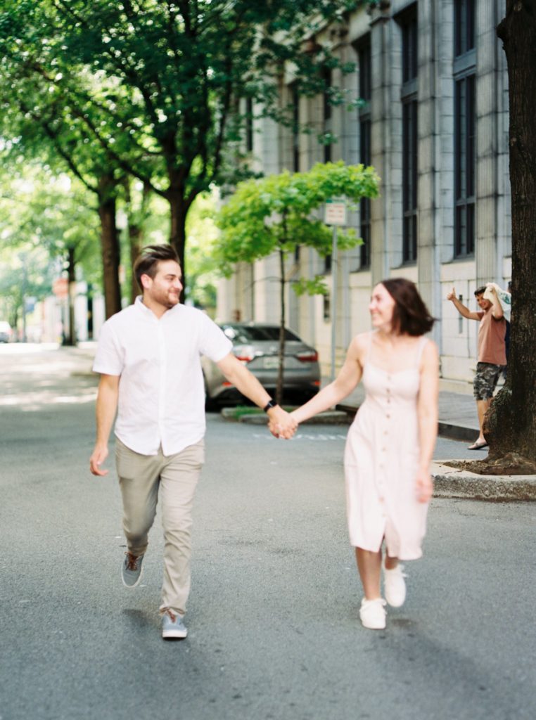 Classic and colorful engagement portraits off of Gay Street in Knoxville