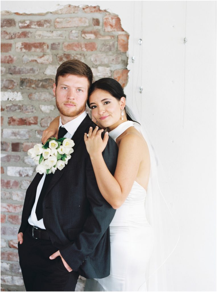 Wither & Bloom Floral Design studio with a effortless modern bride and groom photographed on film wedding