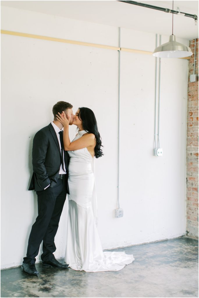 Nostalgic nontraditional bride and groom wedding at Wither & Bloom Floral Design studio in the Old City Knoxville.