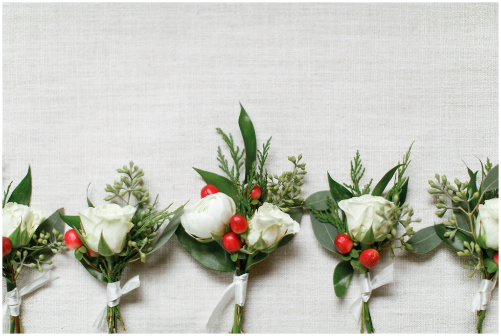 Simple, elegant winter themed wedding boutonnières - Holly Michon Photography