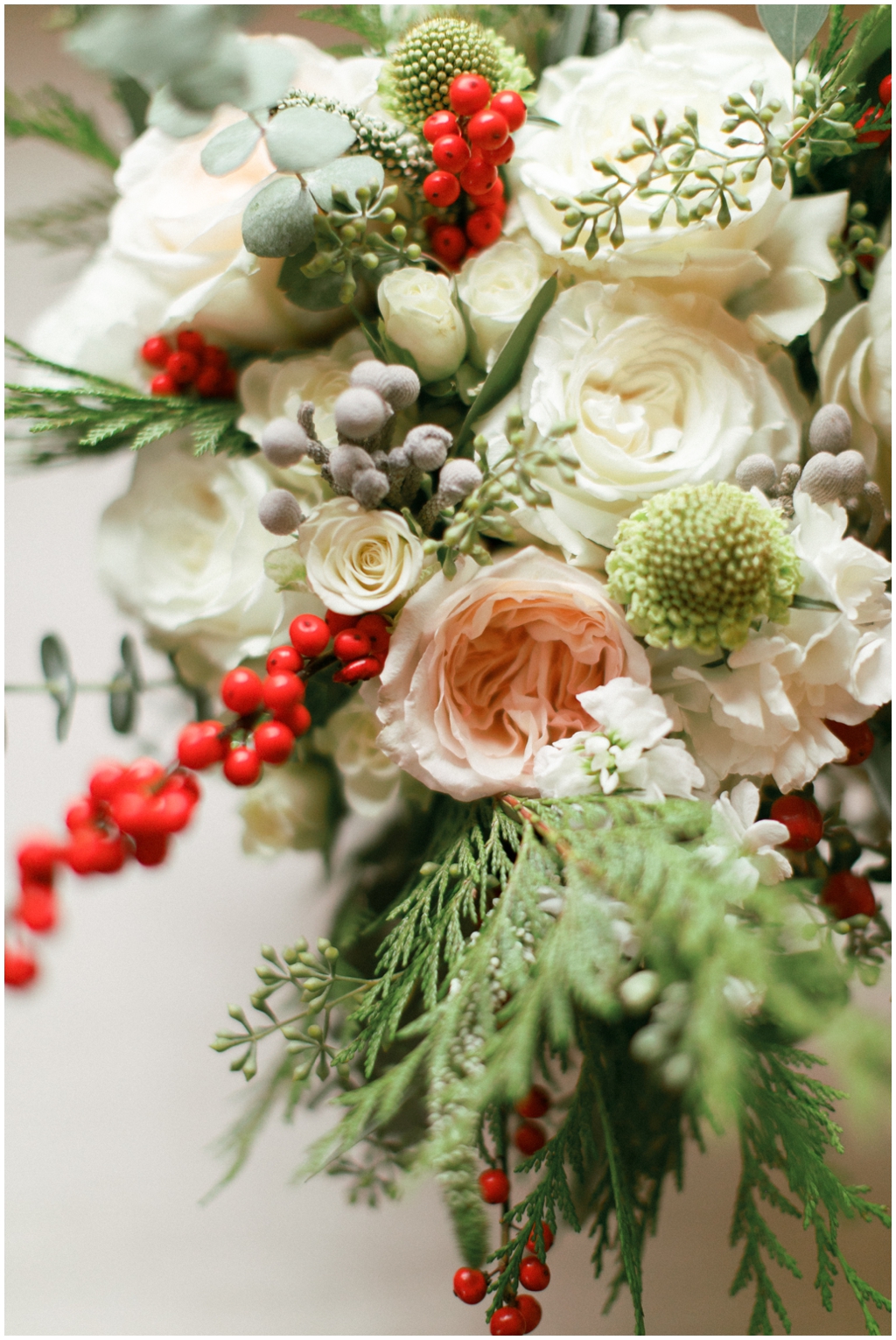Gorgeous winter themed whimsical wedding florals with berries - Holly Michon Photography