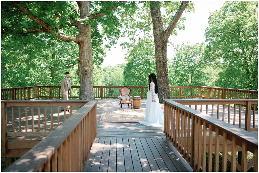 Bride and groom share first look and moment alone in nature.