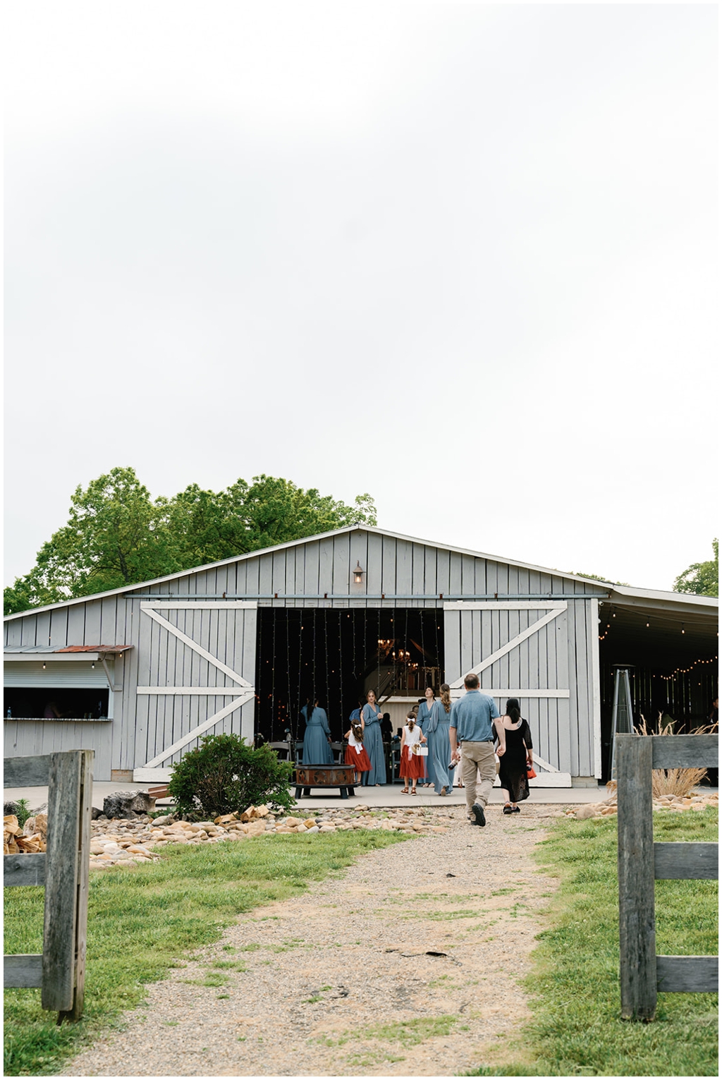 Reception barn begins to fill with guests after sentimental Knoxville spring wedding.