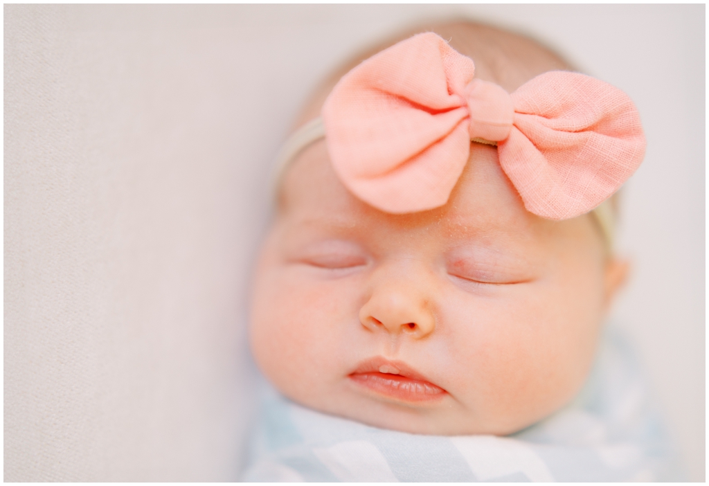 Newborn swaddled in blanket during photography session in Knoxville, TN.