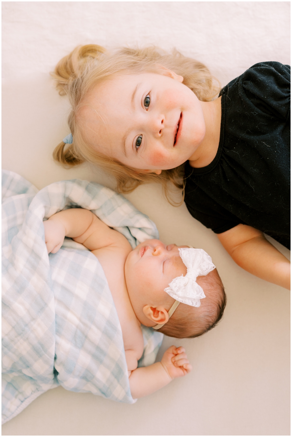 Adorable sister duo during quaint and intimate newborn session in Knoxville, TN.