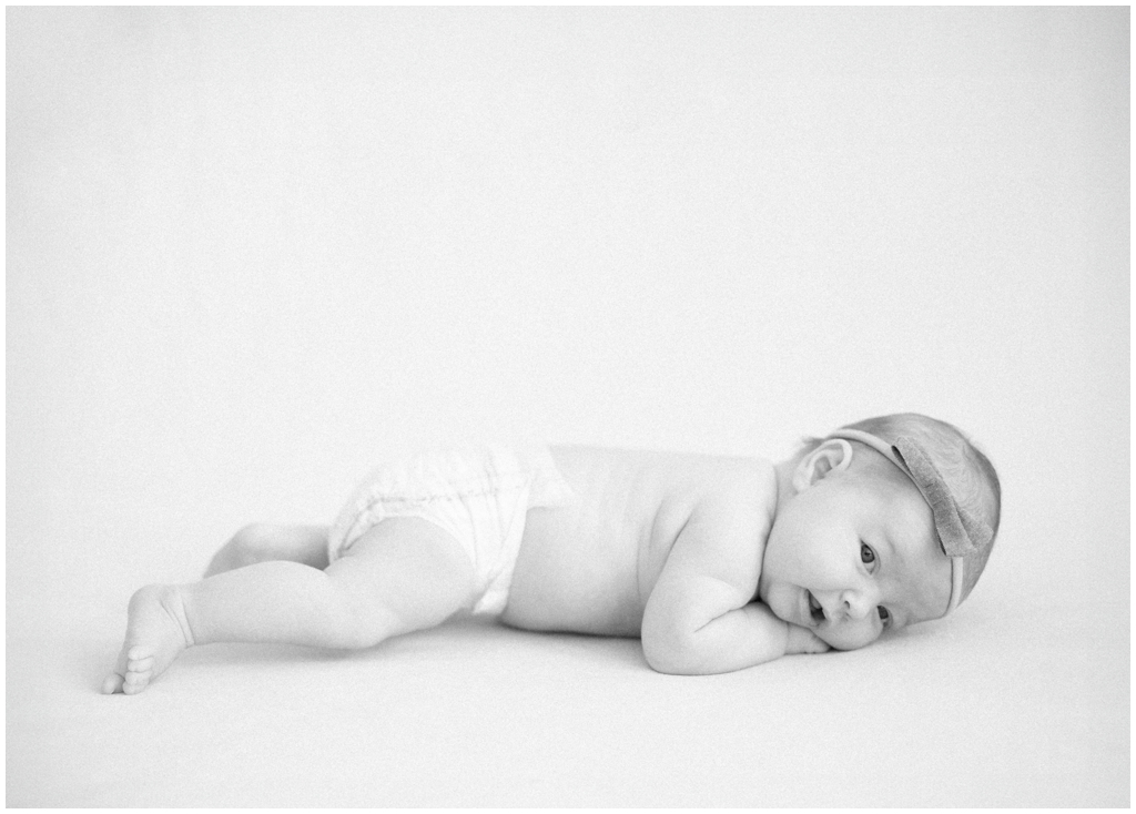 Black and white film photo of newborn during newborn session in Knoxville, TN.