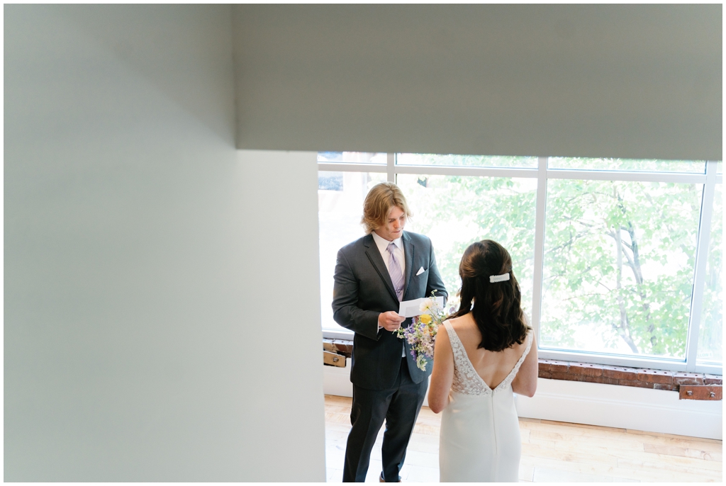 Bride and groom share vows before wedding during classy and romantic summer Maryville, TN wedding.