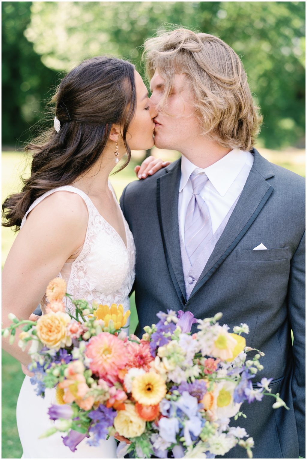 Bride and groom share a kiss for classy and romantic wedding in Maryville, TN.