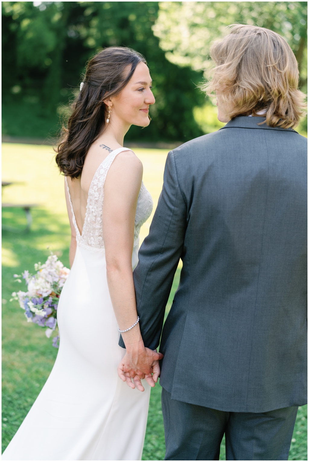 Bride and groom look lovingly at each other for classy and romantic Maryville, TN wedding.