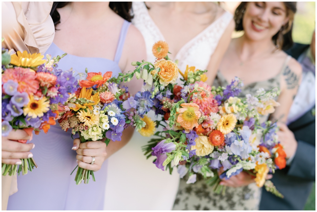 Detail image of floral bouquets of the bridal party in Maryville wedding.