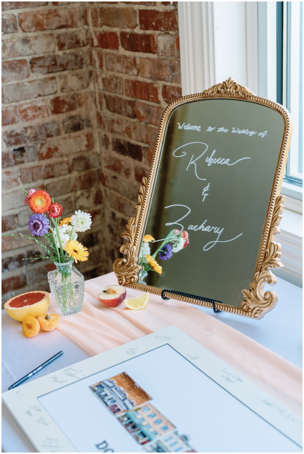 Guest book table for Rebecca and Zachary at Skyview venue.