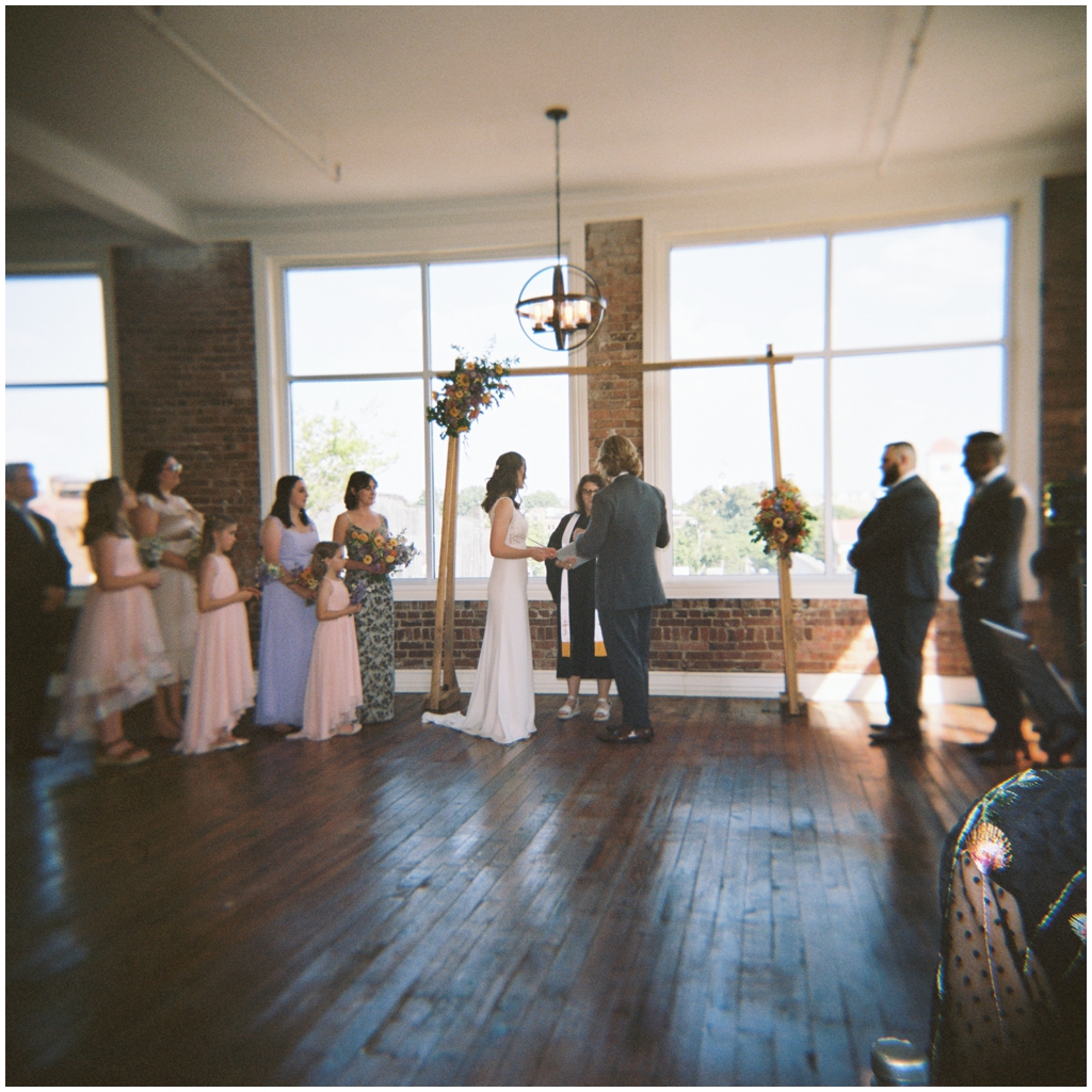 Film image of bride and groom during ceremony at Skyview venue in Maryville, TN.