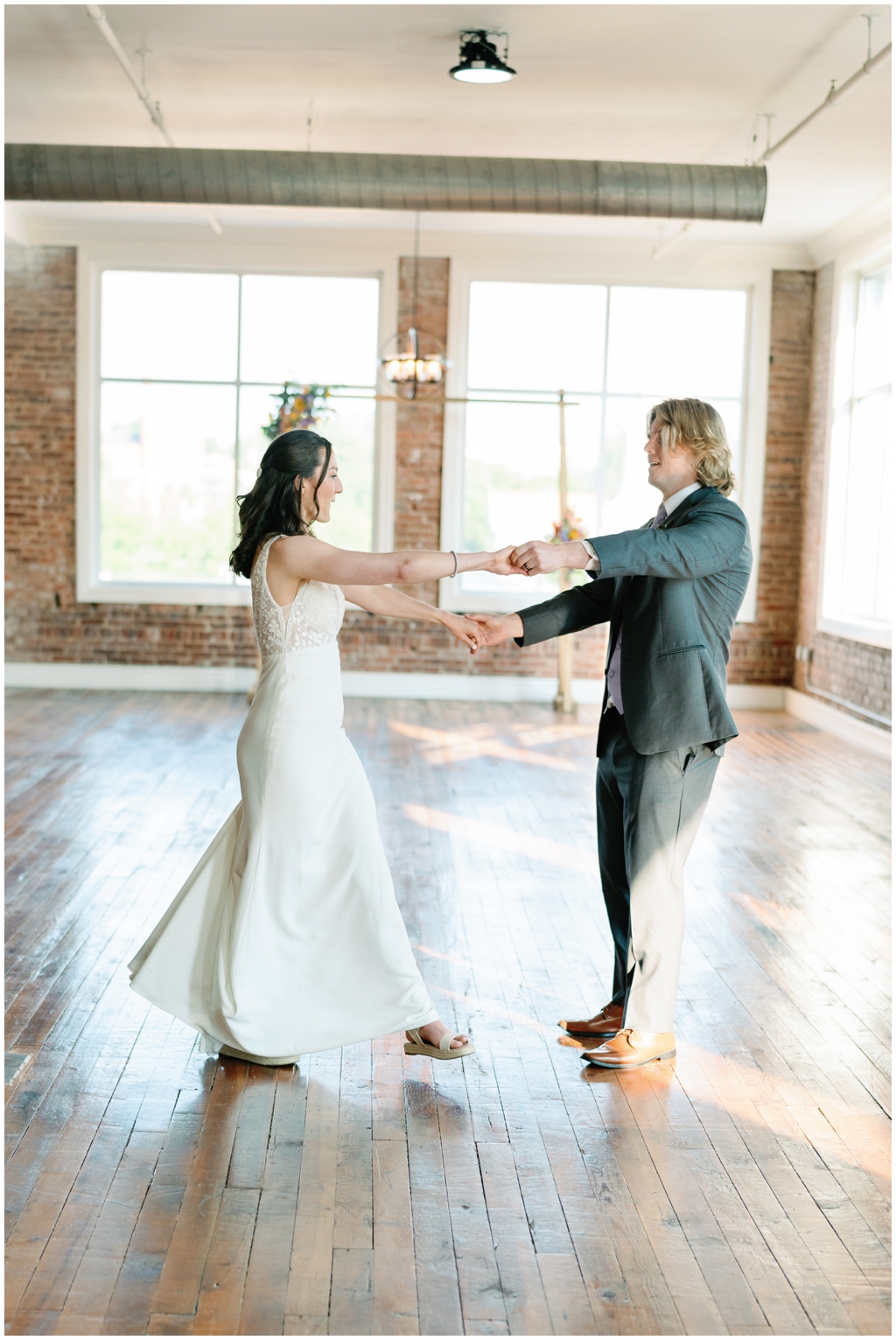 Bride and groom dance on the dance floor during classy and romantic wedding in Maryville, TN.