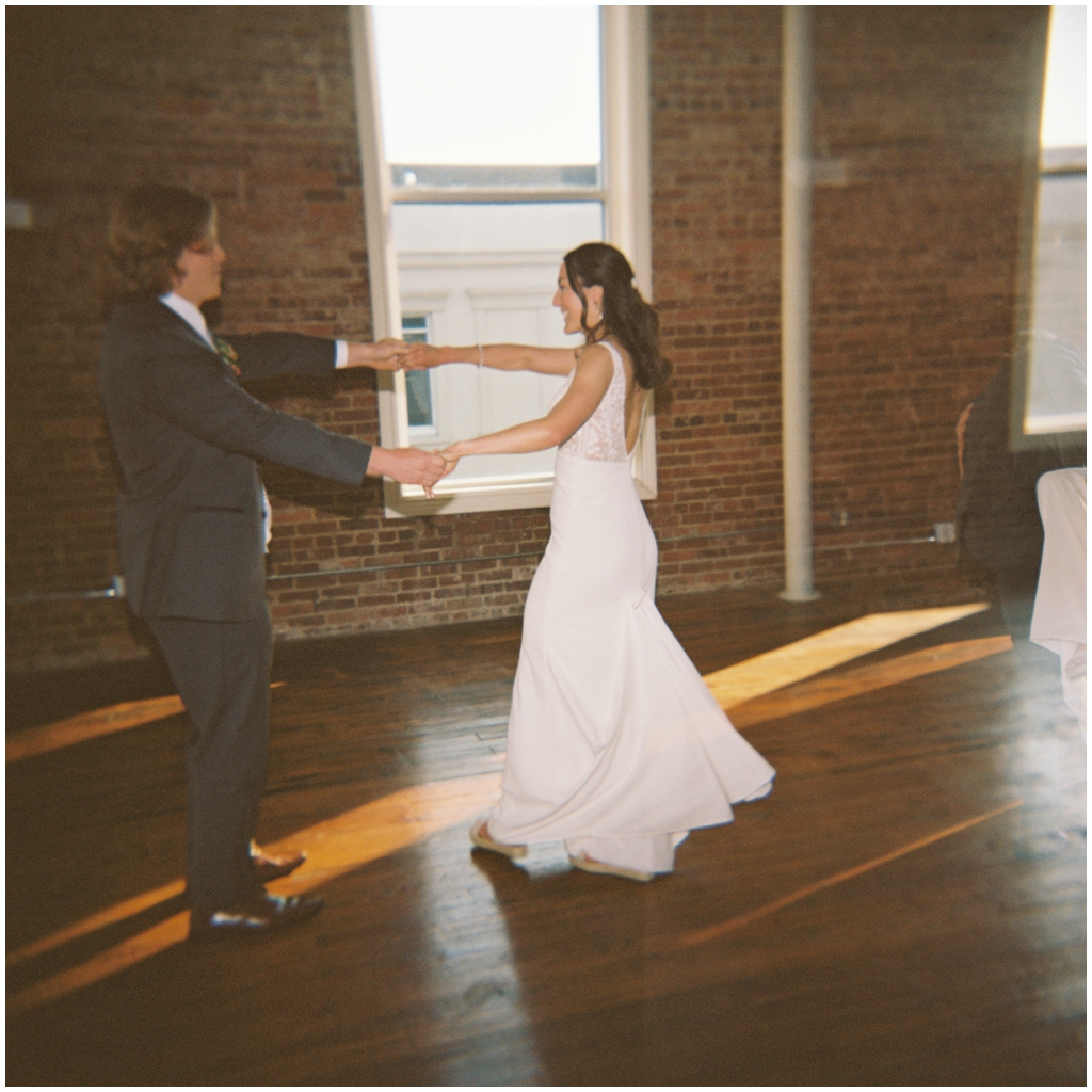 Film image of bride and groom dancing at classy and romantic wedding in Maryville, TN.