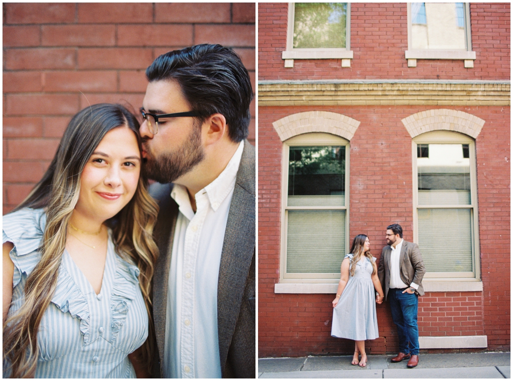 Husband and wife pose in front of brick wall in downtown knoxville for dreamy summer anniversary session