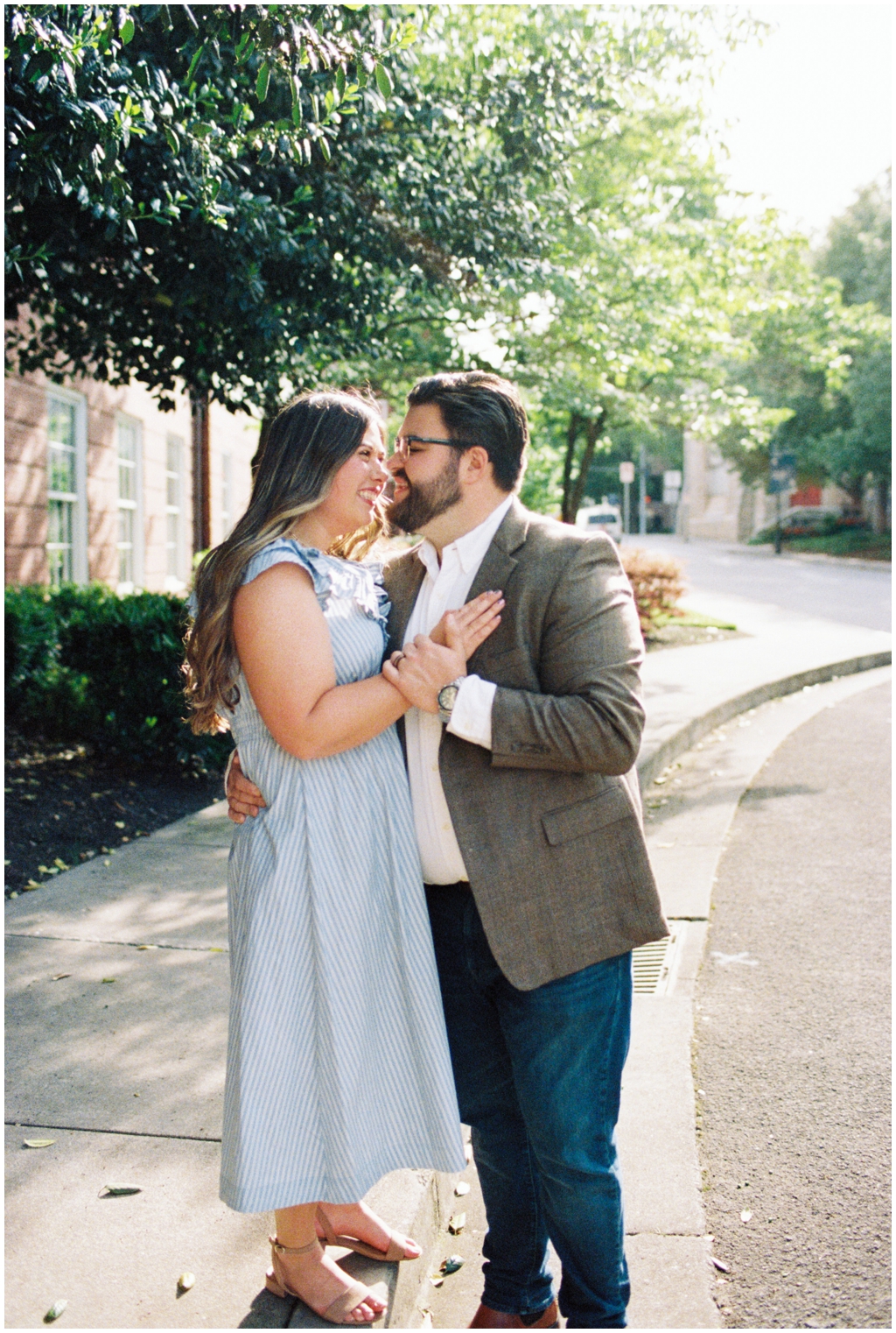 Ashley leans on husband Jackson in downtown knoxville for dreamy summer anniversary session