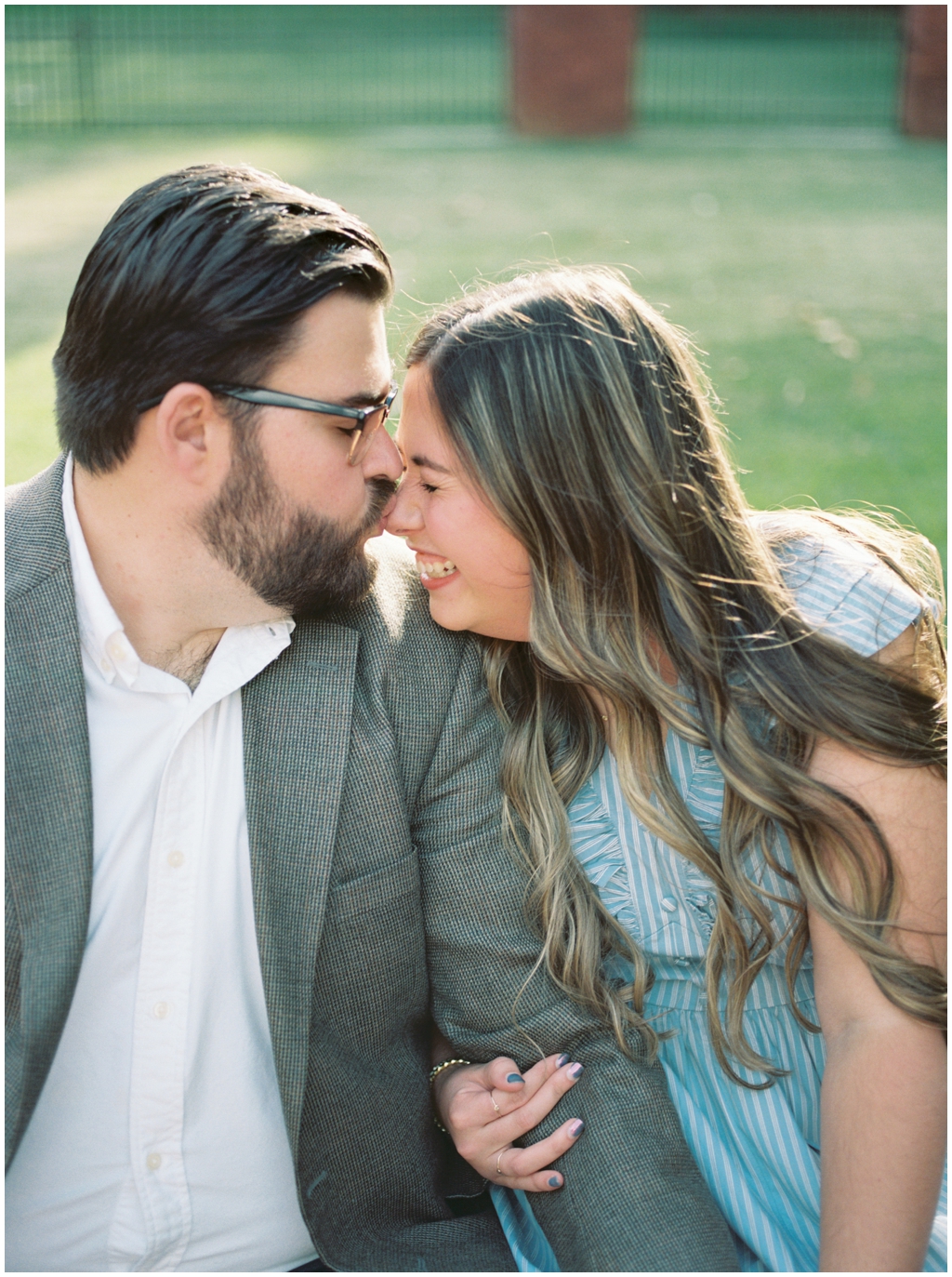 Jackson kisses his wife Ashley on the nose for intimate image during downtown knoxville summer anniversary session