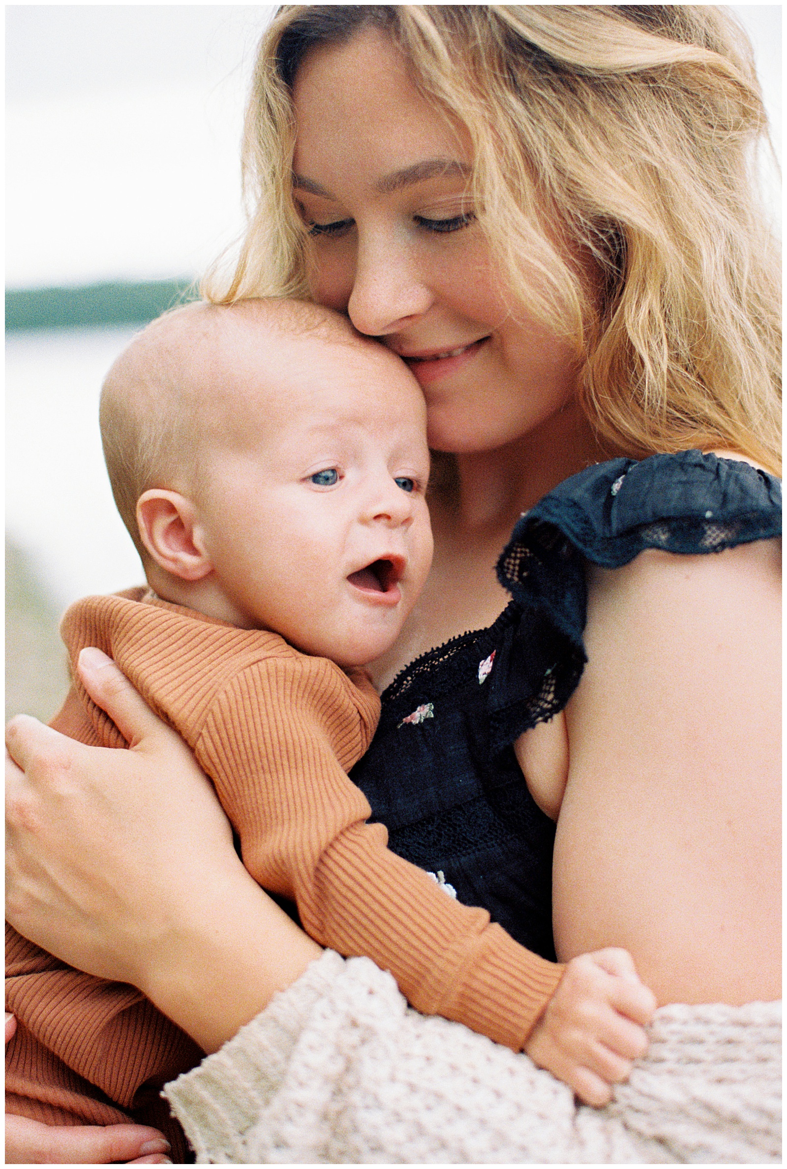 Detailed image of mom and baby during family session at Lake Michigan