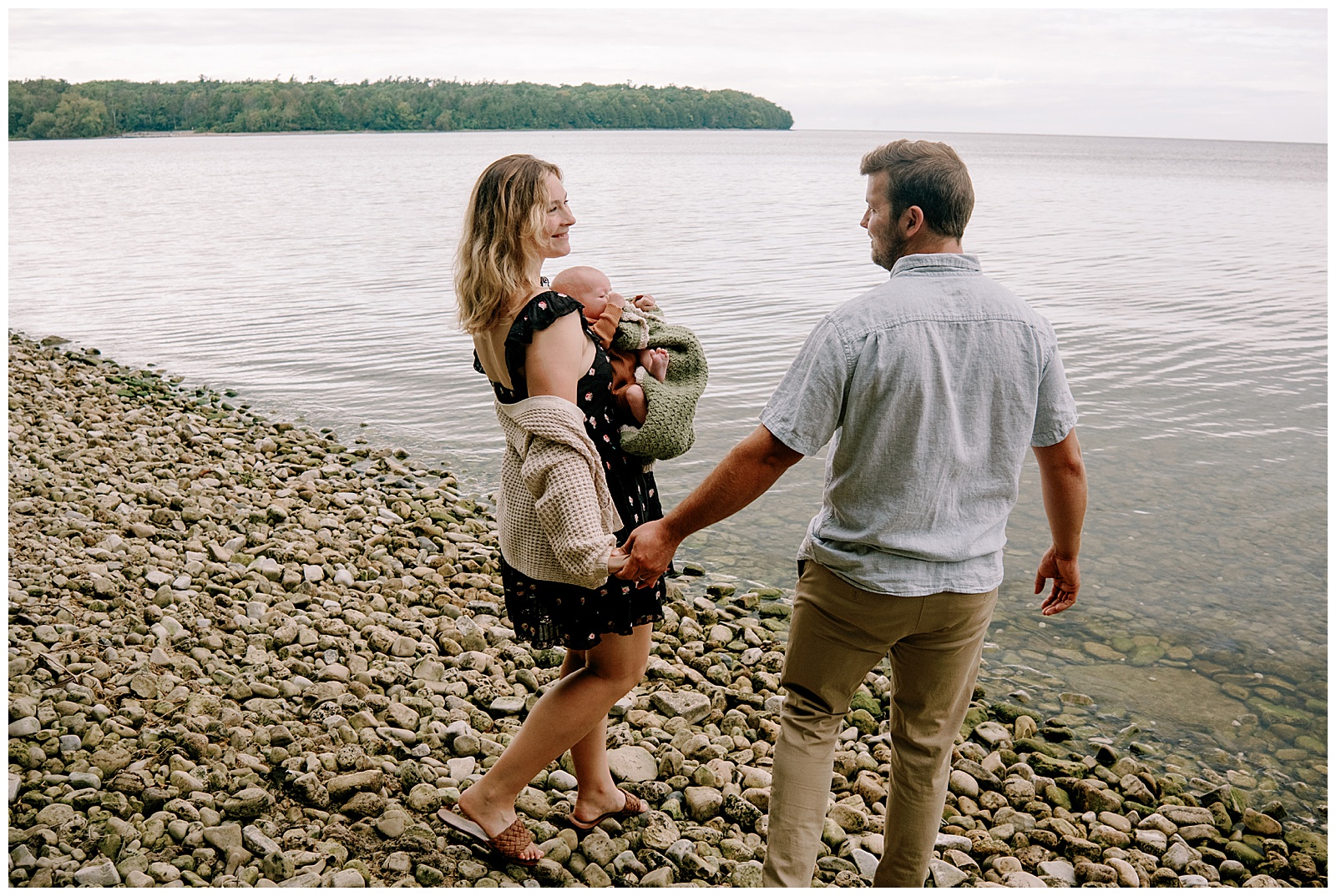 Mom and dad hold hands for relaxed vibey family session