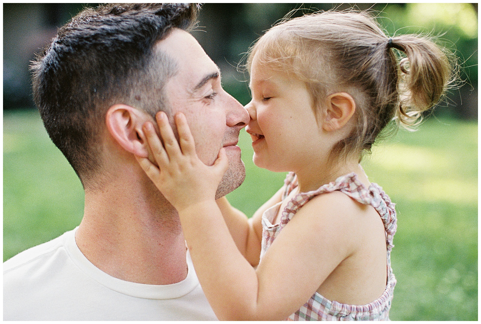 Dad and daughter share playful moment during Knoxville in-home maternity session