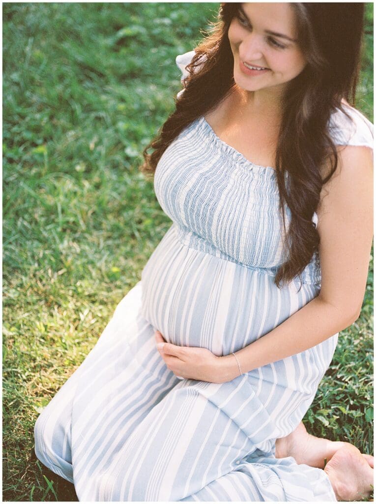 An expecting mother photographed elegantly and timelessly, not cringe-y, during her maternity session in Knoxville, TN.