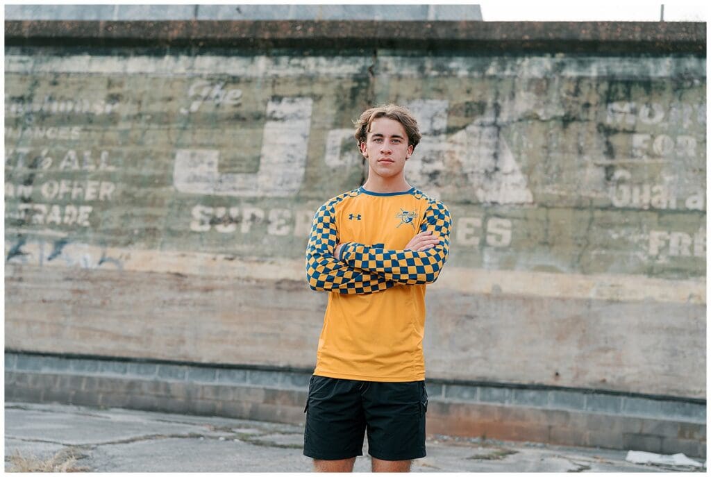 Maryville and Knoxville senior photographer - portrait of senior boy in his soccer jersey. 
